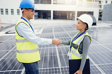 Image showing Solar energy, solar panel worker and renewable energy handshake electricity deal of sustainability, power plant development and innovation. Clean energy, sustainable technology and green construction