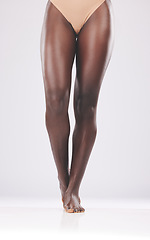 Image showing Beauty, skin and legs by black woman in studio for skincare, laser and hair removal against white background. Wellness, leg and girl model cleaning, hygiene and smooth, perfect and soft mockup