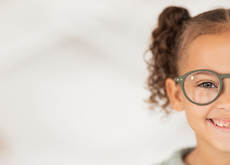 Image showing Mockup, advertising and girl with glasses from optometrist for vision in eyes at a clinic, store or shop. Half, happy and child with medical eyeglasses from optician with mock up space for marketing