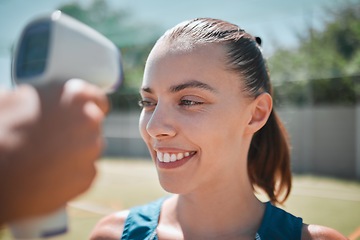 Image showing Sports woman check forehead with thermometer, fever test and covid 19 health safety risk on outdoor court. Active, fitness and young female, corona virus compliance and symptoms on infrared laser gun