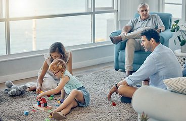Image showing Carpet, learning and family with child teaching building development, creative thinking and home education with father, mother and grandparents. Mom, dad and girl kid play game together for education