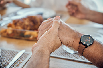 Image showing Holding hands, praying thanks for food and prayer for lunch, dinner table and worship, gratitude and respect in family home. Closeup christian spiritual people, eating together and pray faith in god