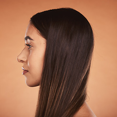 Image showing Hair, beauty and woman face for healthy hairstyle and hair care on a brown studio background. Hair style, haircare and cosmetic treatment for shiny, healthy hair in a salon with a headshot profile