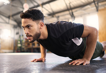 Image showing Fitness, training and push up with man in gym for training, muscle and workout endurance. Determination, strong and power with bodybuilder and floor exercise for sports, wellness and athlete