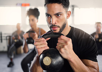 Image showing Strong man, personal trainer and group training with kettlebell squat exercise, workout and fitness in gym club. Bodybuilder coach teaching sports class with heavy weights, challenge and powerlifting