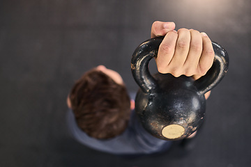 Image showing Fitness, bodybuilding and kettlebell workout by man at a gym from above, training and wellness with mockup. Exercise, bodybuilding and weightlifting by guy in sports center, power and muscle mock up