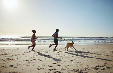 Image showing Fitness, running and dog with couple at beach for freedom health and summer exercise. Sports, wellness and relax with man and woman runner with pet by the ocean for travel, support and peace workout