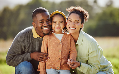 Image showing Black family, child and bonding in nature park, sustainability garden environment and countryside grass field in trust, love and support. Portrait, smile and happy black woman, man and girl in summer