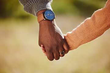 Image showing Parent, child and holding hands for care, love and support in trust, relationship and walk together in the park. Hand of father or mother with kid walking for family time and safety in the outdoors