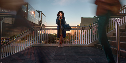 Image showing Woman, phone and typing at night in city, social media or text message. Tech, mobile or black female on 5g smartphone in busy town, web browsing or networking, texting online or checking email on app