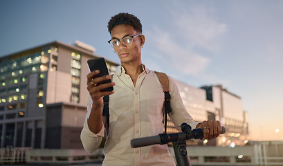 Image showing Scooter, smartphone and man in city at night texting, scroll social media and GPS map technology for street directions. Modern university student, cellphone text message and mobile web communication