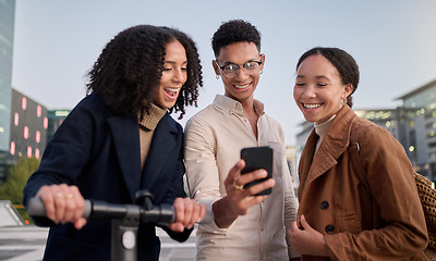 Image showing City, scooter and friends with phone in street or outdoors on social media. Night, diversity and happy people with electric moped and 5g mobile for networking, internet browsing or chatting online.