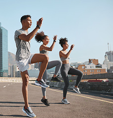 Image showing Diversity, fitness friends or runner stretching in city for marathon, running exercise or sports workout. Wellness, teamwork health or group of athlete training for warm up , sport or street race