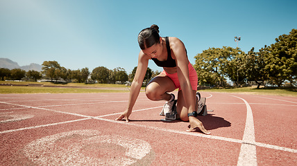 Image showing Runner, stadium and fitness with woman start for running race, training and cardio on outdoor track. Competition, exercise and run for sport, marathon and sprint with workout motivation and endurance