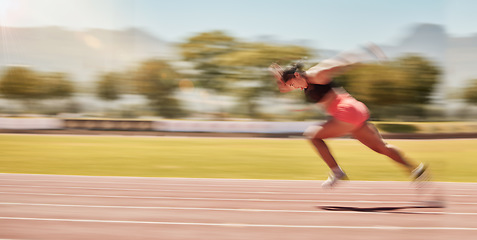 Image showing Athlete, exercise and track running with a woman outdoor training for sports race or marathon or fitness with energy, agile and speed. Runner during workout for goal performance, challenge and race