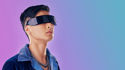 Image showing Beauty, fashion and man with cyberpunk glasses in studio with blue and purple background. Creative, cosmetics and young male model with visor for futuristic style, techno and designer clothing