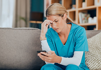 Image showing Phone, healthcare and worry with a woman nurse reading a text message while sitting on a sofa in a hospital office. Mobile, medicine and medical with a female health professional receiving bad news