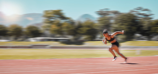 Image showing Speed, track and fast woman running for fitness health, exercise and workout for marathon race, contest or competition. Sports commitment, sprint action or athlete runner training for France olympics