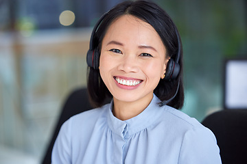 Image showing Call center, asian, woman and sales consultant with a smile for sales, customer support and telemarketing at office for friendly service. Portrait of happy contact us, CRM and telecom service agent