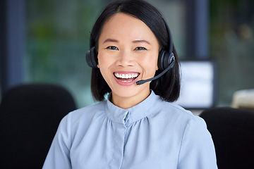 Image showing Portrait, call center and customer service with an asian woman consultant working in a sales office. Crm, contact us and support with a happy female employee working in telemarketing or retail