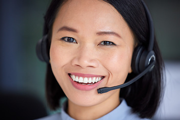 Image showing Face, telemarketing and customer support working in a call center with happy smile. Asian customer service operator with headset consulting, help and online advice for contact us, crm and consultant