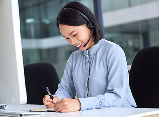 Image showing Call center, customer service and writing with an asian woman consultant working in a telemarketing office. Contact us, computer and receptionist with a female assistant taking notes for sales