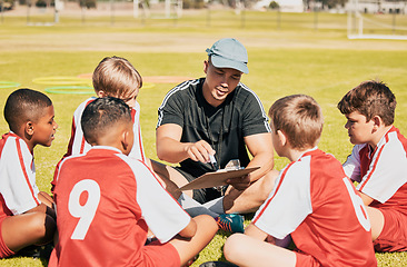 Image showing Teamwork, coaching and football with children on field for training, fitness and sports goals. Planning, pitch and strategy with mentor and soccer player kids learning for exercise, games and manager