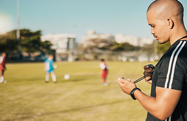 Image showing Soccer, sports and coach with a stopwatch on a field for training, check and challenge with time. Football, fitness and man reading progress of team in sport at a park for motivation in competition