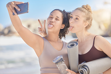 Image showing Happy face selfie, yoga and women with yoga mat exercise at the beach for fitness workout, spiritual health and zen meditation. Fun with a friend, stress relief and pilates wellbeing workout training