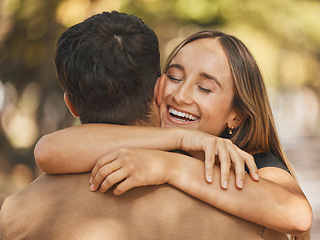 Image showing Love, hug and couple at park, nature or outdoors on date, vacation or holiday. Happy, smile and man and woman hugging, embrace or cuddle with affection or bonding while enjoying quality time together