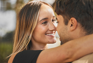 Image showing Love, couple and hug with kiss, smile and bonding together for relationship, marriage and happy. Romance, man and woman being intimate, embrace and romantic for happiness, connect and quality time.