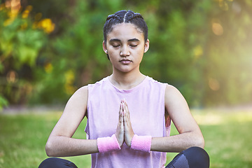 Image showing Woman, yoga and meditation for spiritual wellness, zen or calm exercise for the mind, body and health in nature. Female meditating in mindful awareness for healthy lifestyle and inner peace in a park