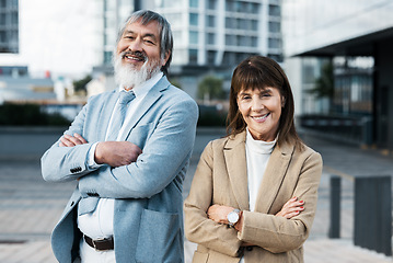 Image showing Business people, senior and urban portrait with man and woman smile, diversity and team in company motivation cityscape. Corporate, mature and professional outdoor with confidence and pride in city.