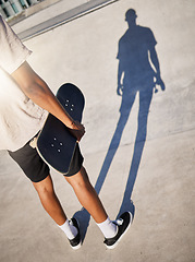 Image showing Skateboard, city and man shadow skate in park athlete ready for training, fitness and skate park exercise. Sports, workout and person from Los Angeles with board on concrete for skateboarding sport