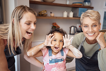 Image showing Happy, mother and grandmother with child baker hands in playful joy or funny laughter with smile for bonding at home. Mama, grandma and kid baking together for fun family time activity in the kitchen