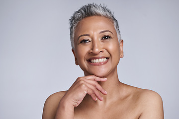 Image showing Skincare, beauty and portrait of a senior woman with a natural, organic and cosmetic face routine. Happy, smile and elderly lady with a facial skin treatment isolated by a gray background in a studio