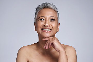 Image showing Beauty, skincare and portrait of senior woman for facial, makeup or botox. Anti aging, wellness and smile with face of mature model against gray background in studio for health, botox or dermatology