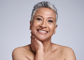 Image showing Senior, beauty and portrait of natural woman with mature skin for dermatology cosmetic advertising. Skincare, wellness and happy face of model for antiaging marketing with mockup in white studio.