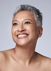 Image showing Mature woman, face or skincare glow on studio background or gray hair, health wellness or makeup cosmetics. Smile, happy or Indian beauty model or facial texture, dermatology or collagen in self love