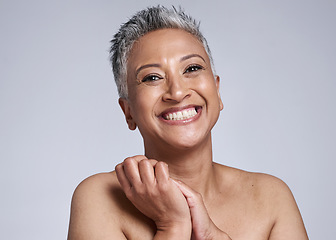 Image showing Skincare, beauty and senior dermatology with black woman in studio with smile, happiness and glow with cosmetic, makeup and facial product. Face portrait of mature model with healthy skin after botox