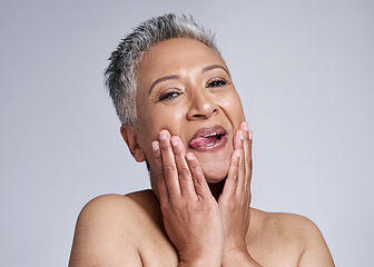 Image showing Beauty, senior and comic portrait of woman for cosmetic wellness, health and antiaging marketing. Funny, crazy and excited face of mature skincare model with tongue out for white studio mockup.