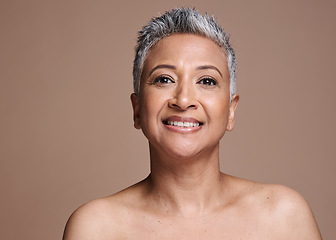 Image showing Portrait, cosmetics and senior woman face for skincare, wellness and natural beauty for health against studio background. Makeup, mature lady and elderly female with smile, confident and smooth skin.