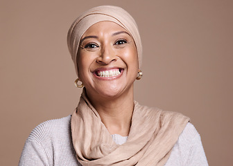 Image showing Muslim, portrait and beauty woman in studio with cosmetics, makeup and fashion for Saudi Arabia or islamic culture. Happy, smile and face of an arabic model with skincare, skin glow and religion