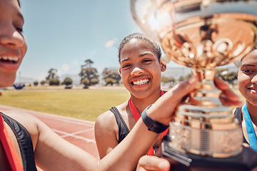 Image showing Winner, trophy and track team celebrate olympic relay teamwork, sprint competition or marathon race victory. Award, goal achievement and success celebration for athlete friends, runner or black women