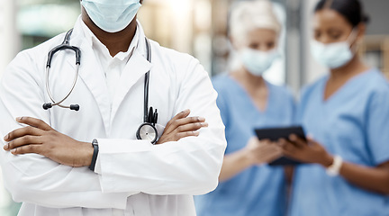 Image showing Leadership, covid or black man doctor in hospital with stethoscope for healthcare vision, mission or goal motivation. Medical, medicine or insurance nurse for health, surgery or wellness in clinic