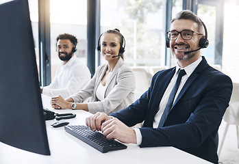 Image showing Finance, contact us and financial consultant in a call center with diversity working in customer support. Smile, portrait and happy fintech telemarketing agents talking to clients in customer service