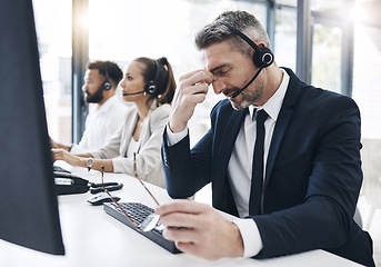 Image showing Call center, customer service and man with headache, stress and tired of working in office. Burnout, crm and frustrated male telemarketing consultant in customer support on call with difficult client