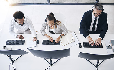 Image showing Team, call center and customer support agents from above working on a sales strategy in the office. Crm, contact us and customer service consultants in collaboration for a telemarketing consultation.