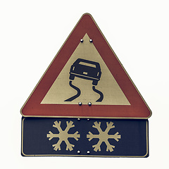 Image showing Vintage looking Slippery road sign