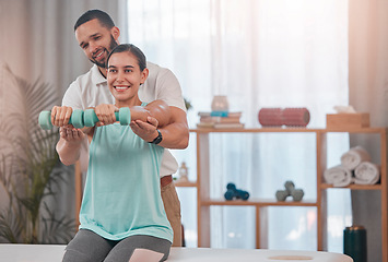 Image showing Physiotherapy, dumbbell and exercise by woman for recovery, rehabilitation and healing with physiotherapist. Physical therapy, girl and weight training for osteoporosis, accident and bone treatment